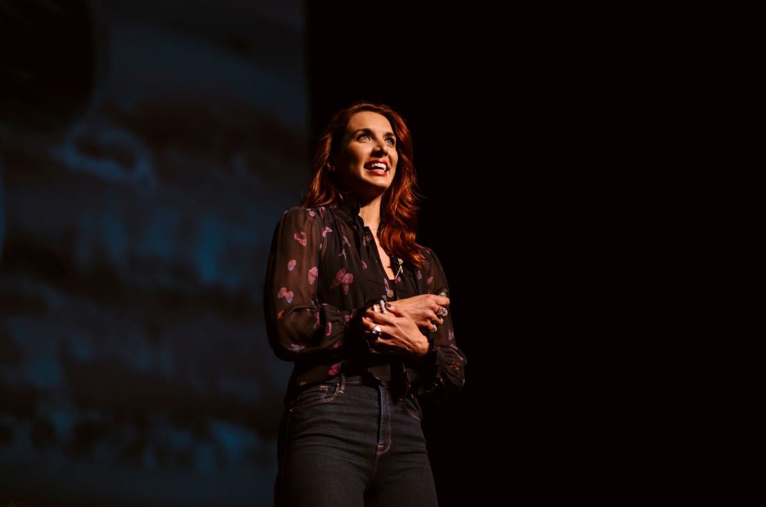 A female founder pitch on stage