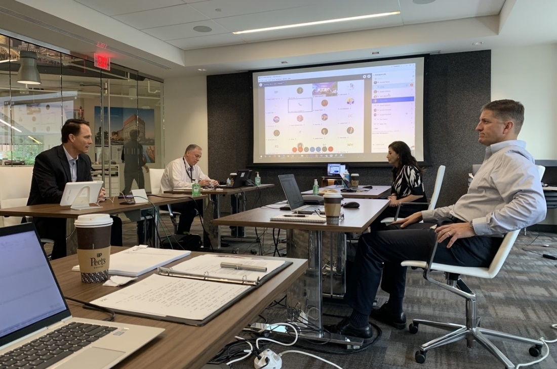 HDR staff in a federal business meeting with staff