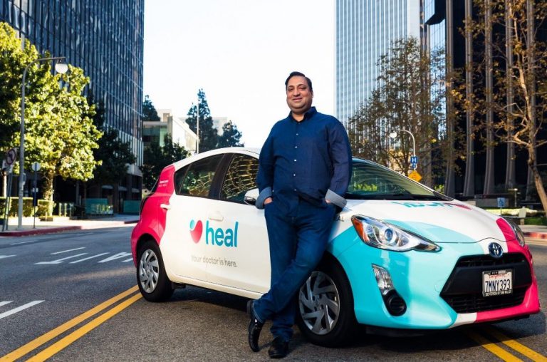 Heal CEO next to the Home care delivering car