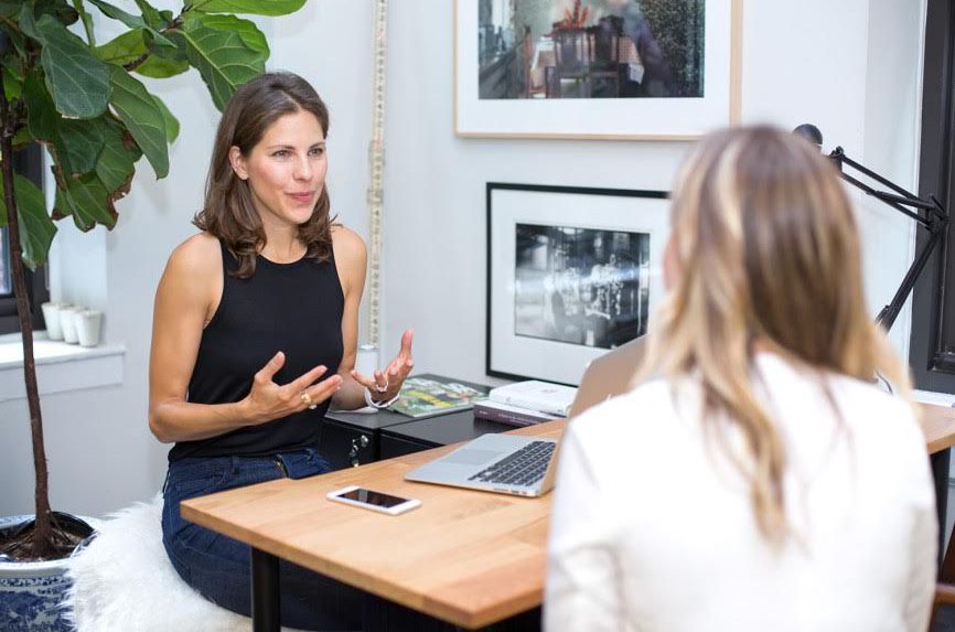 Robin Berzin talk to patient at the office