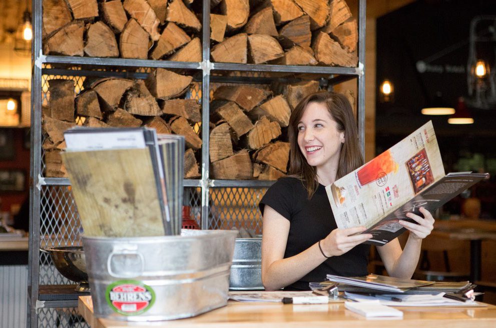 A young female small business owners prepare for restaurants open