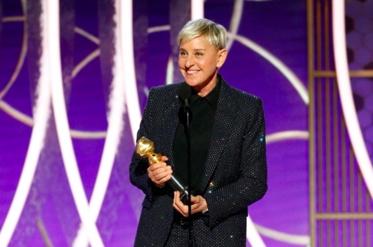 Ellen DeGeneres on stage with award