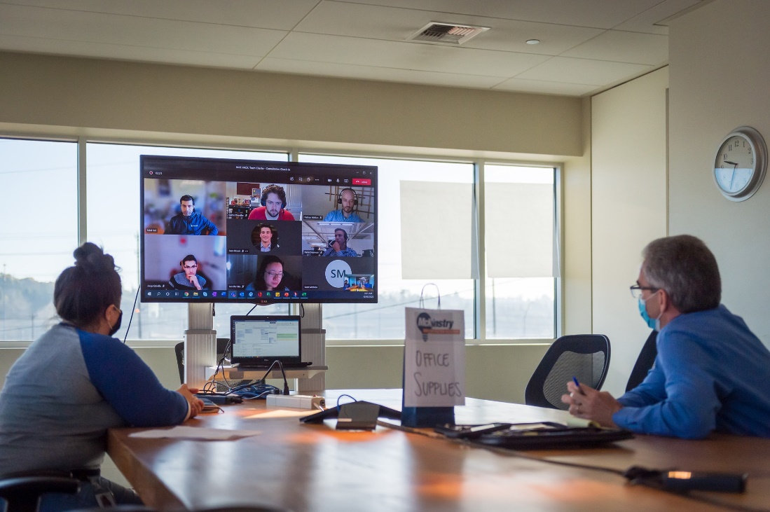 Mckinstry staff in a meeting with the remote team