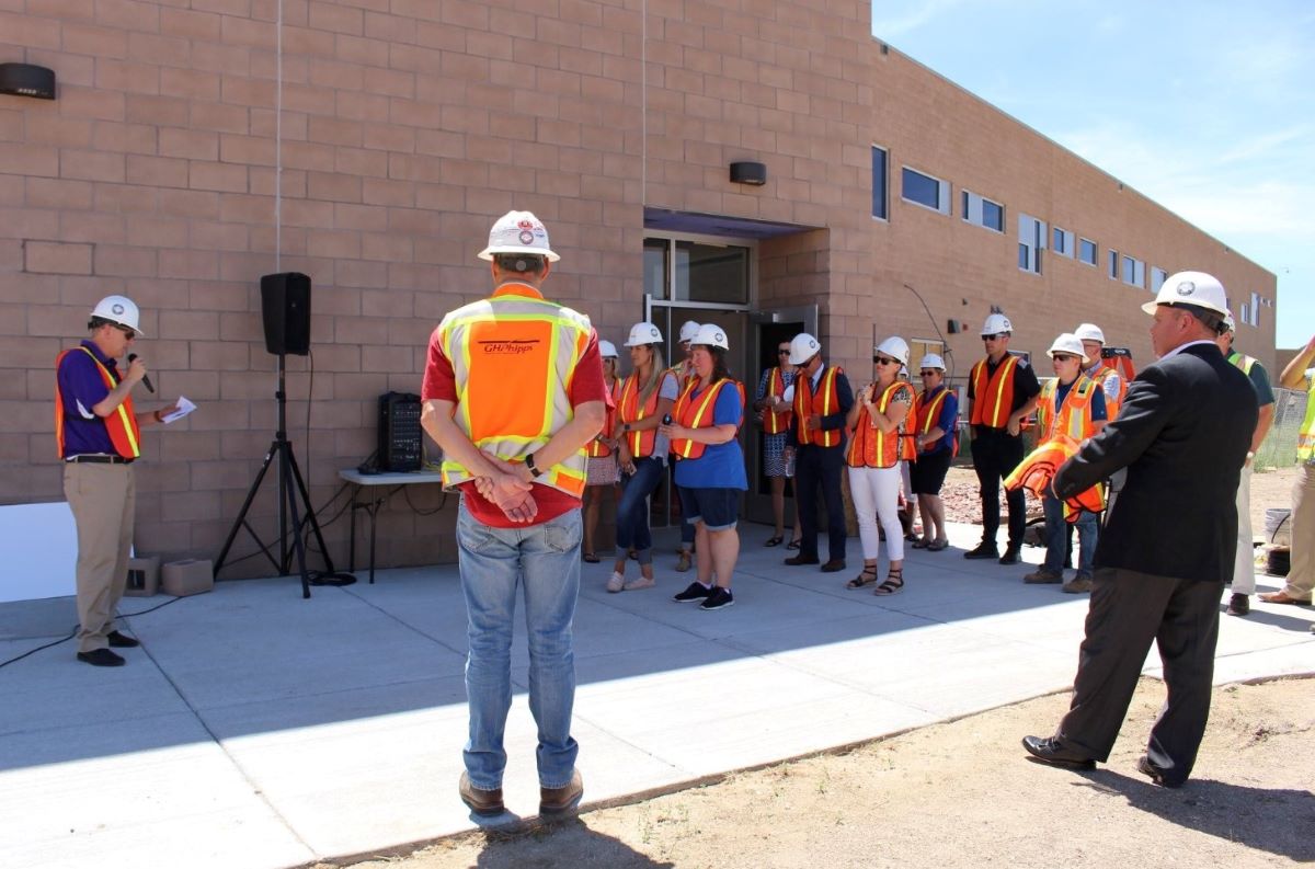 G.H Phipps staff review safety rule at a job site