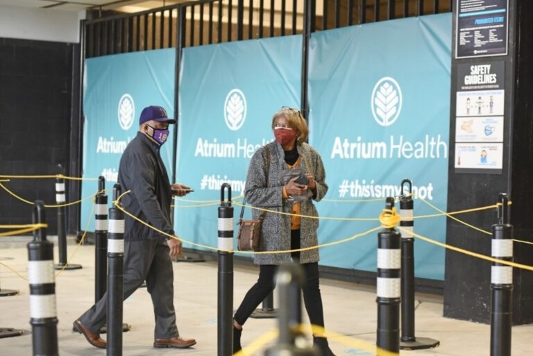 Customers walk into local Atrium Health hospital