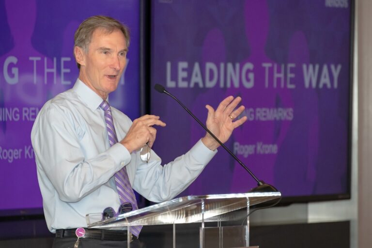 Leidos CEO speaks at a conference
