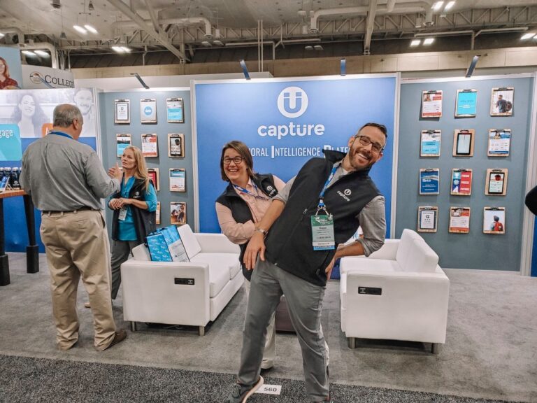 staff at Capture Higher Ed collaborate with customers at conference