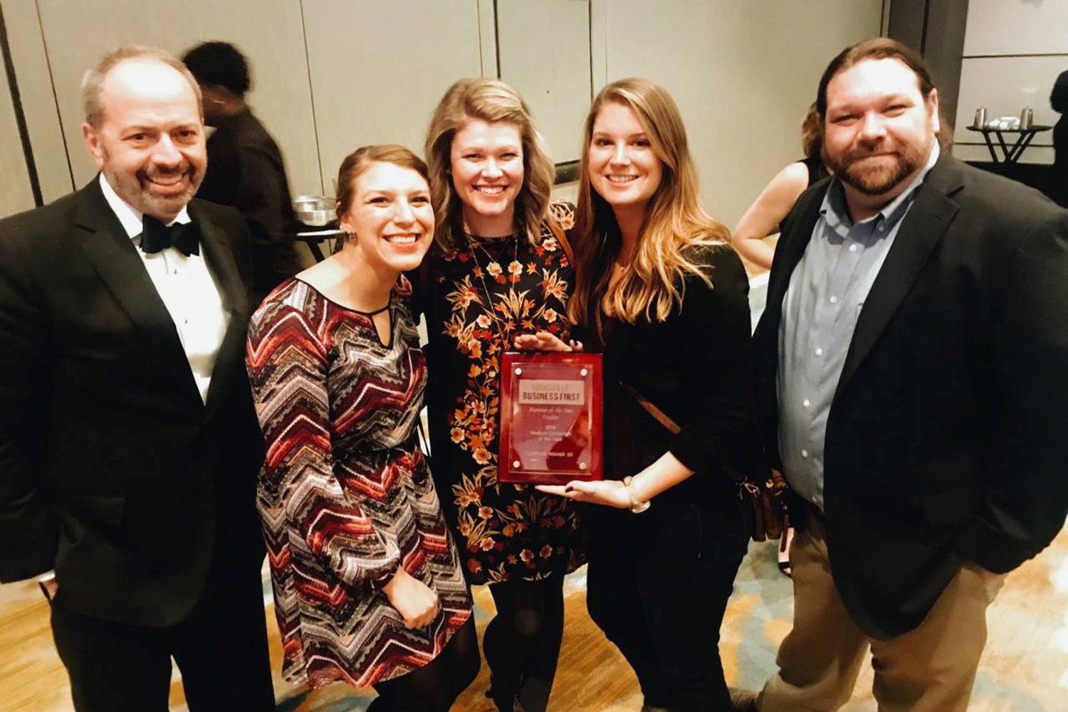 staff from Capture Higher Ed receive industry award