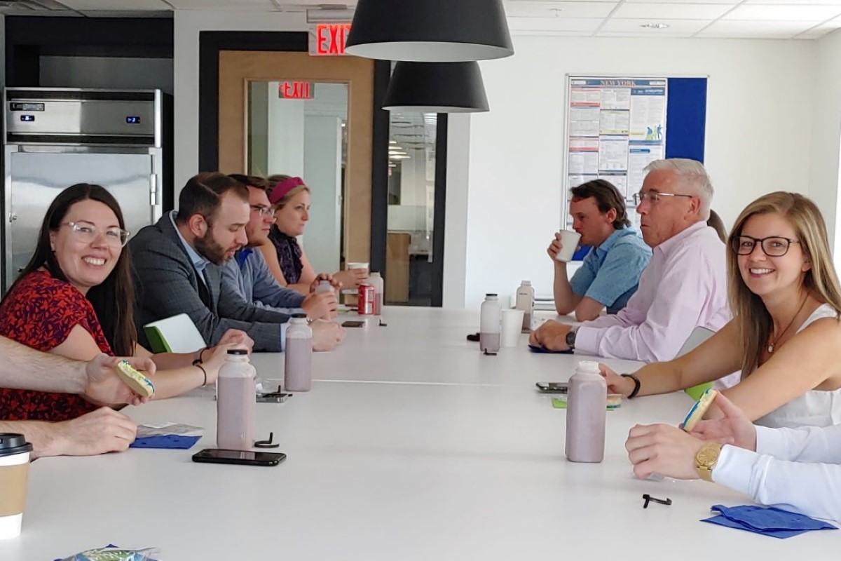 Professional people collaborate in a lunch break