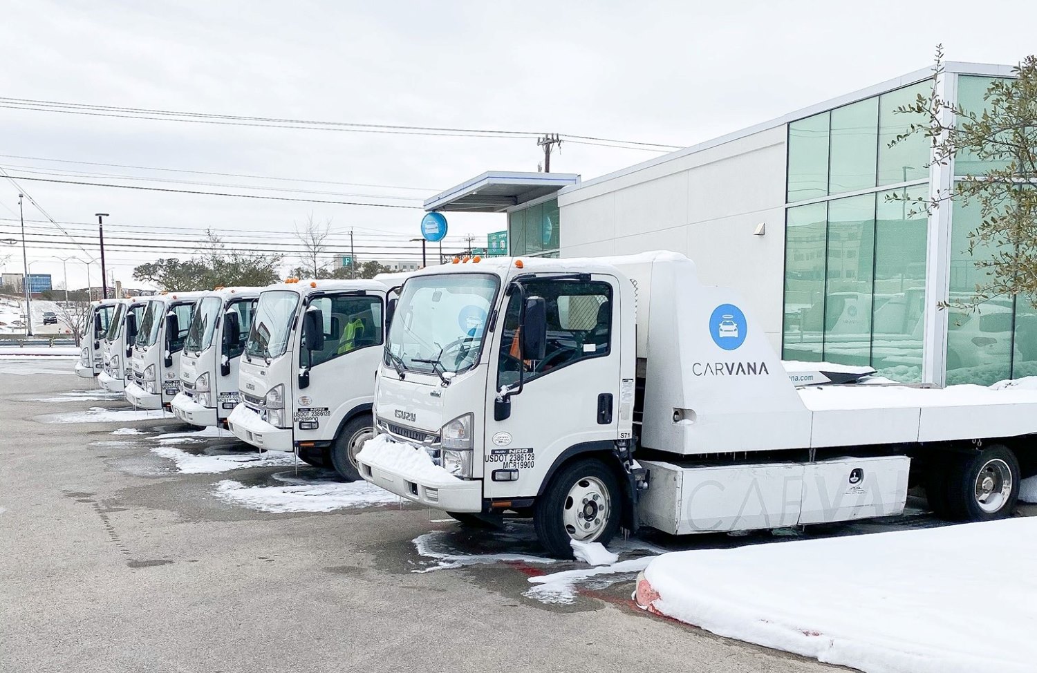 Carvana truck at a dealership location