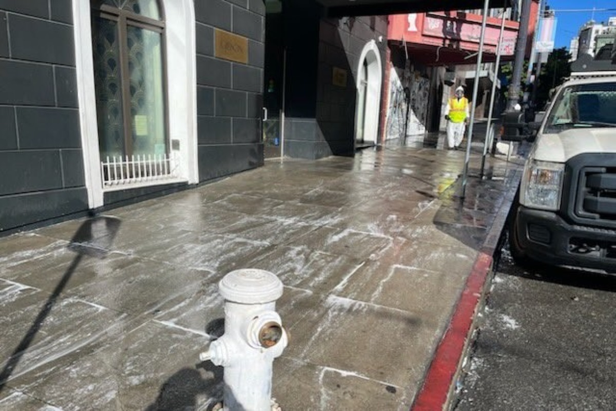 authority conduct clean-up activities in downtown San Francisco.