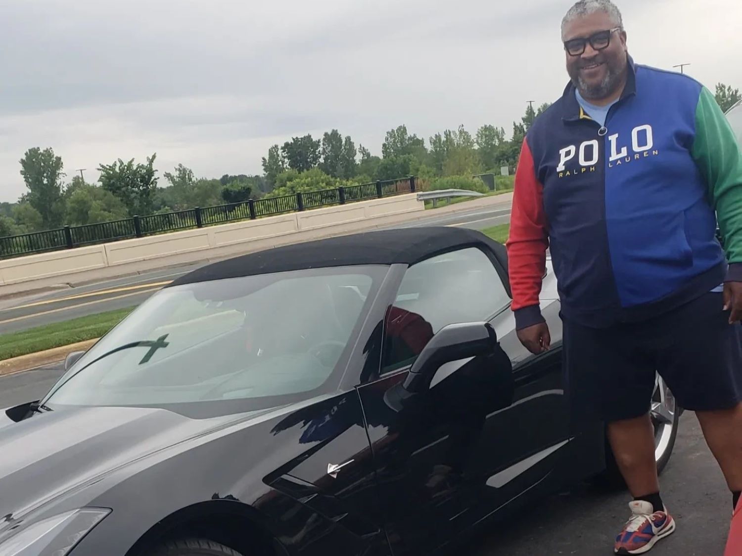 Robert Harvey III with his car