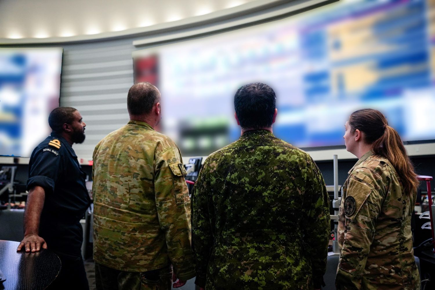 U.S. Cyber Command civilians watching the codes