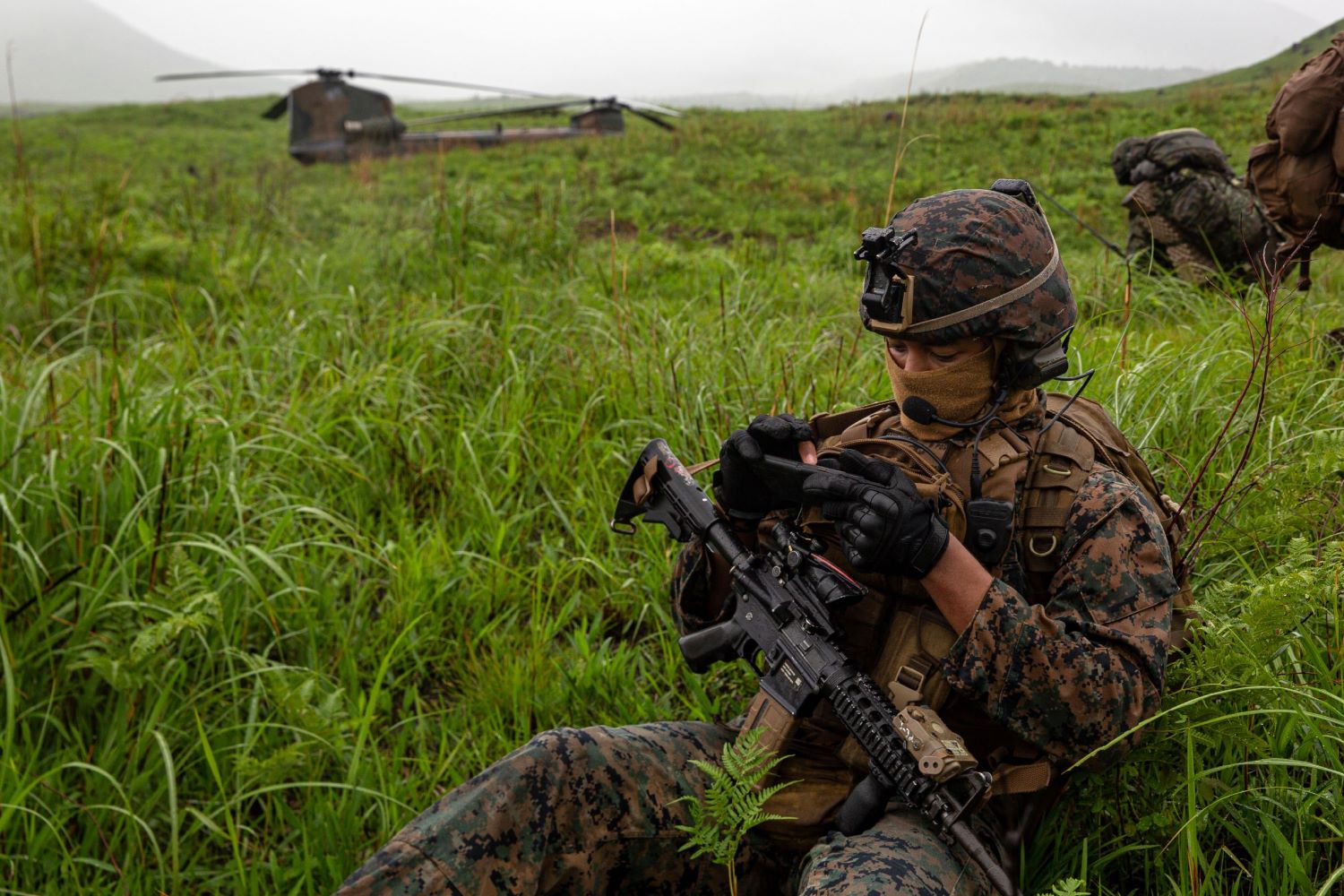 soldier controls a drone