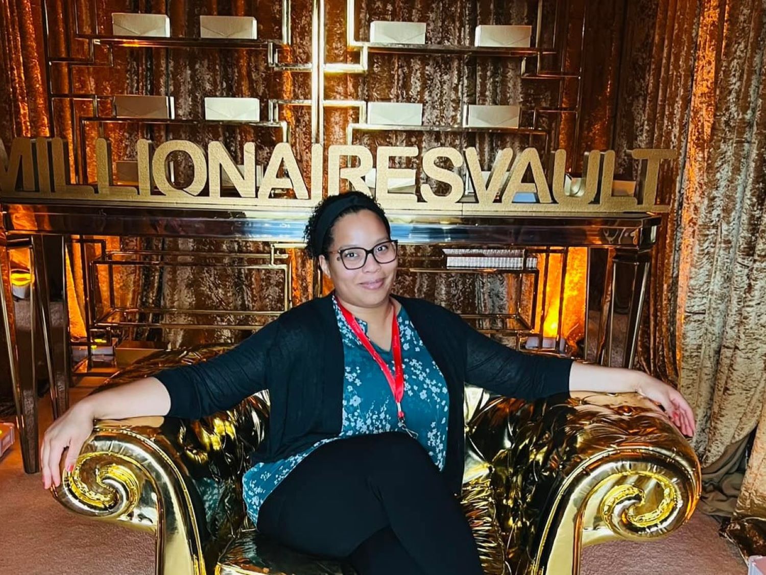 Dr. Jeannie Headley sits in a chair