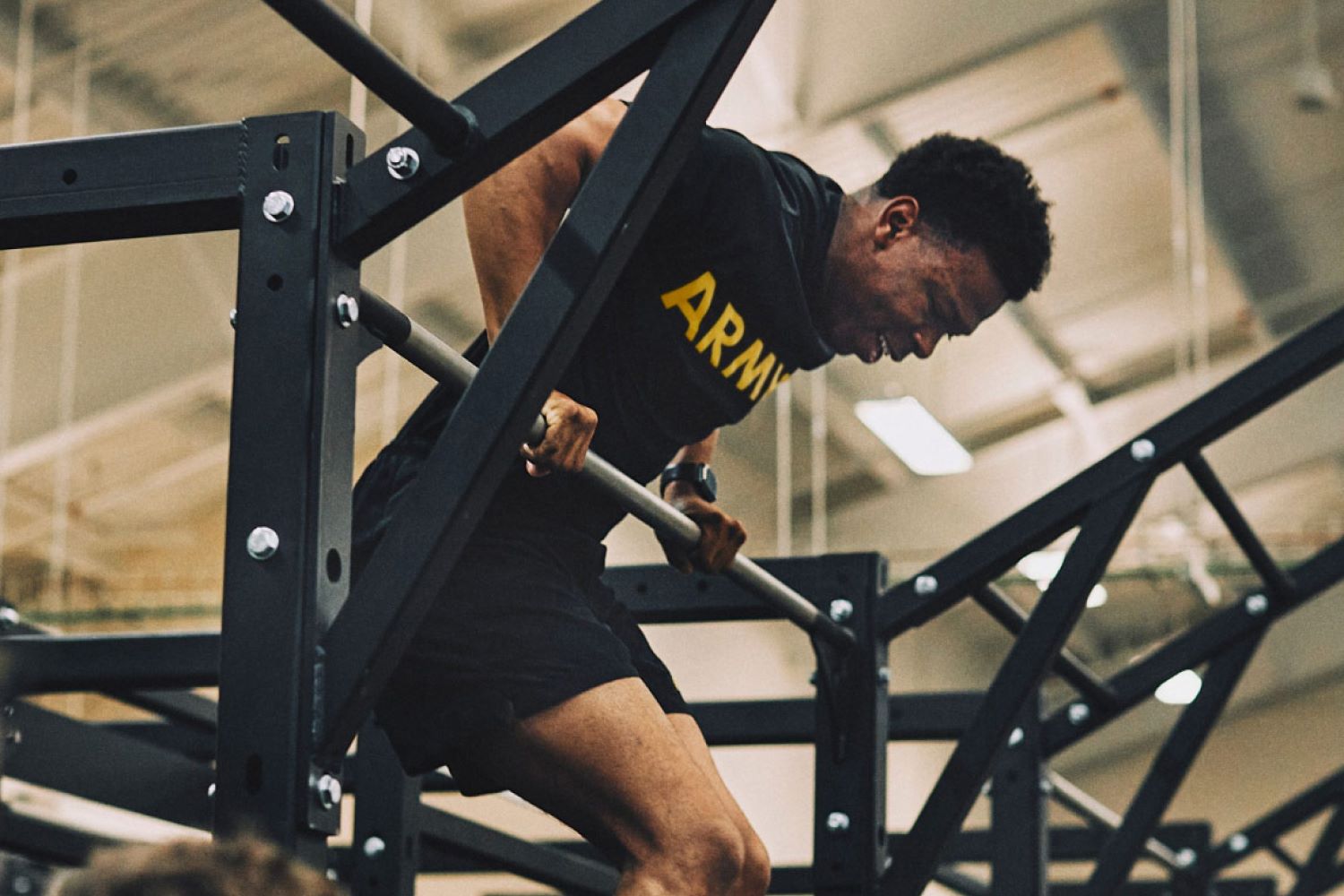 soldier is doing pull-ups