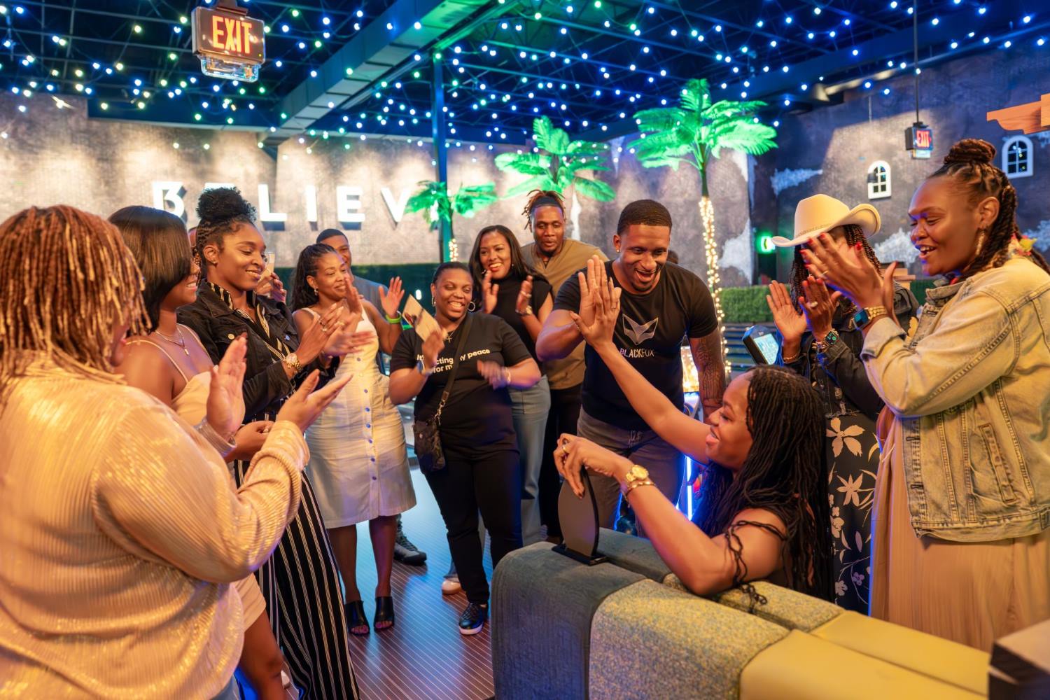 Black Fox's employees and owner in an event